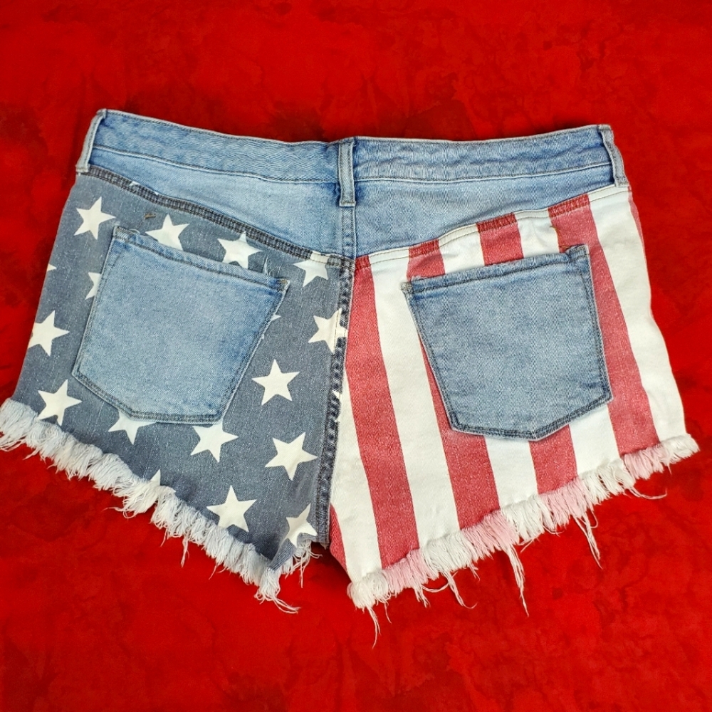 High-rise destroyed stars and stripes denim shorts